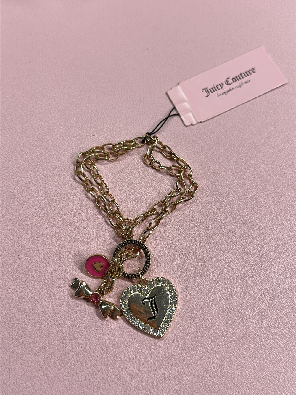 Juicy Couture Gold-Tone Heart Charm Bracelet with Pink Accents